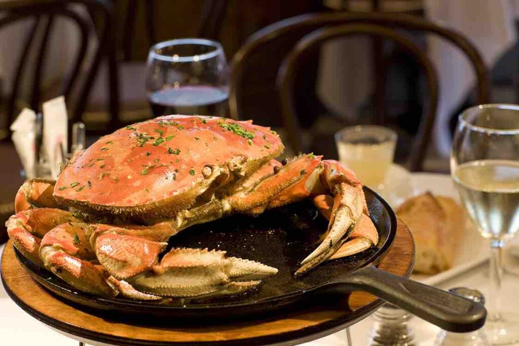 Whole dungeness crab meat on a plate