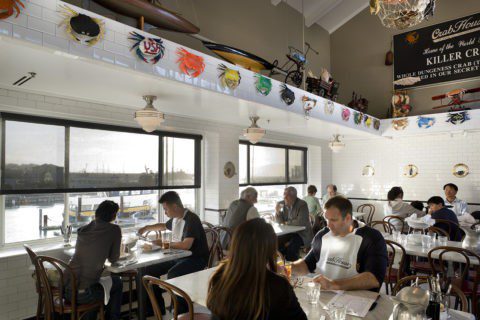 Couples enjoying dinner date idea at Crab House at Pier 39 San Francisco