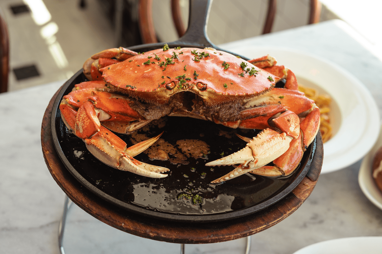 Crab House at PIER 39’s Killer Crab on a skillet that is one of PIER 39’s dining seafood options